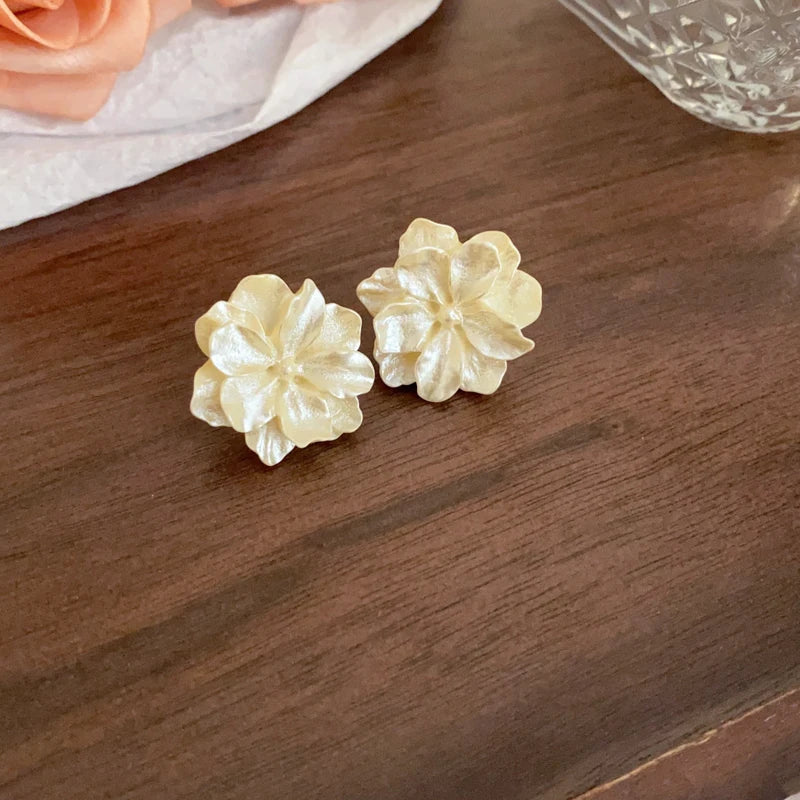 Boucles d'oreilles fleurs jaunes resine