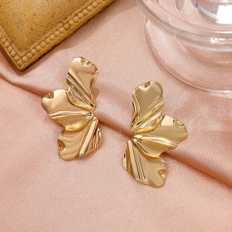 Boucles d'oreilles fleurs moitiés dorées