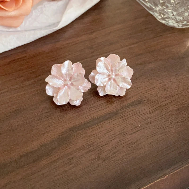 Boucles d'oreilles fleurs roses resine