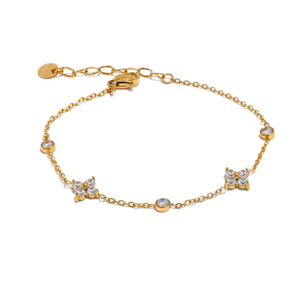 Bracelet à deux fleurs dorées avec cristaux
