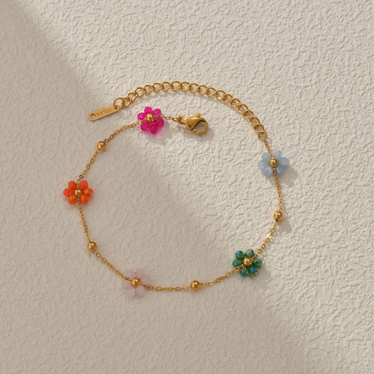 Bracelet avec fleurs multiples multicolores