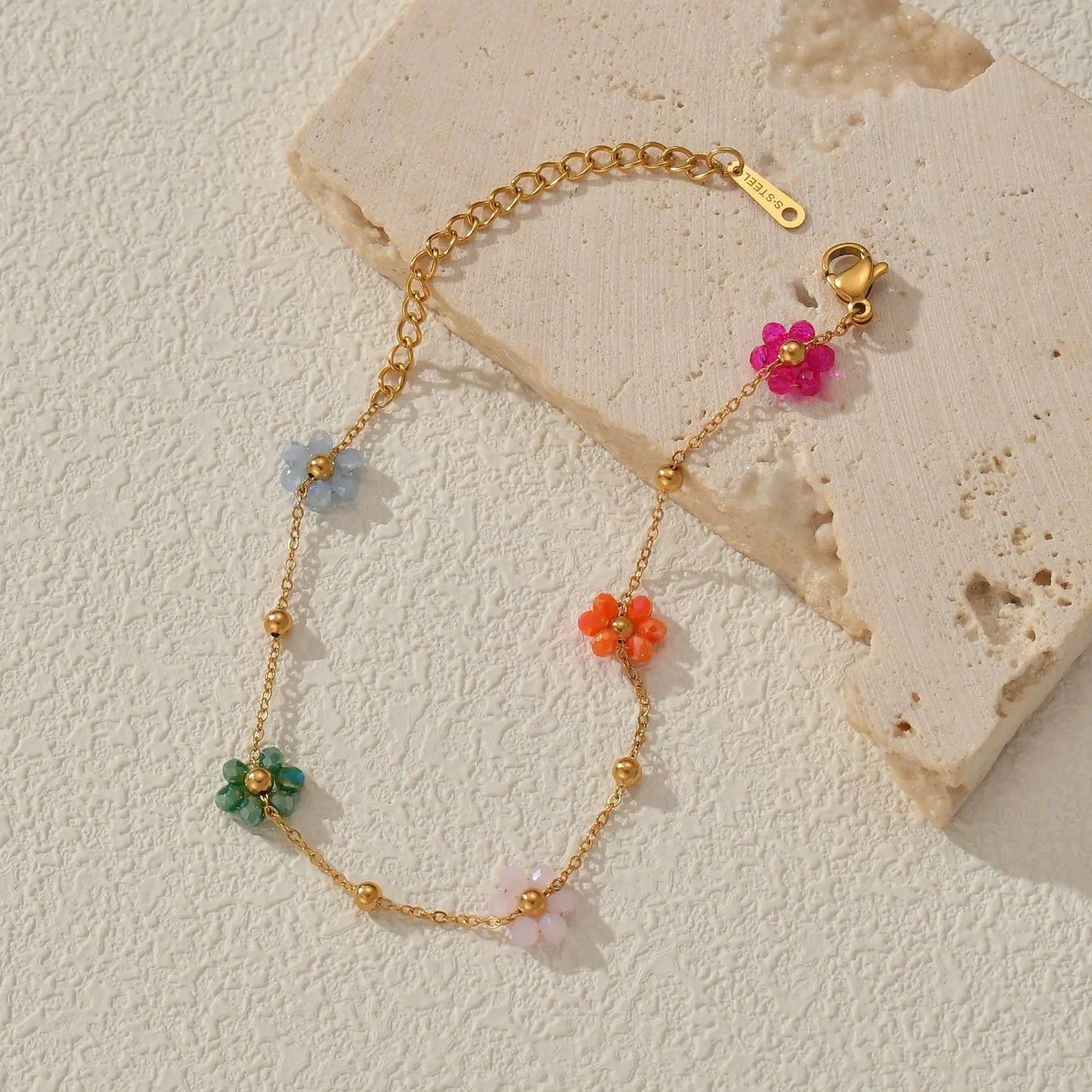 Bracelet avec fleurs multiples multicolores