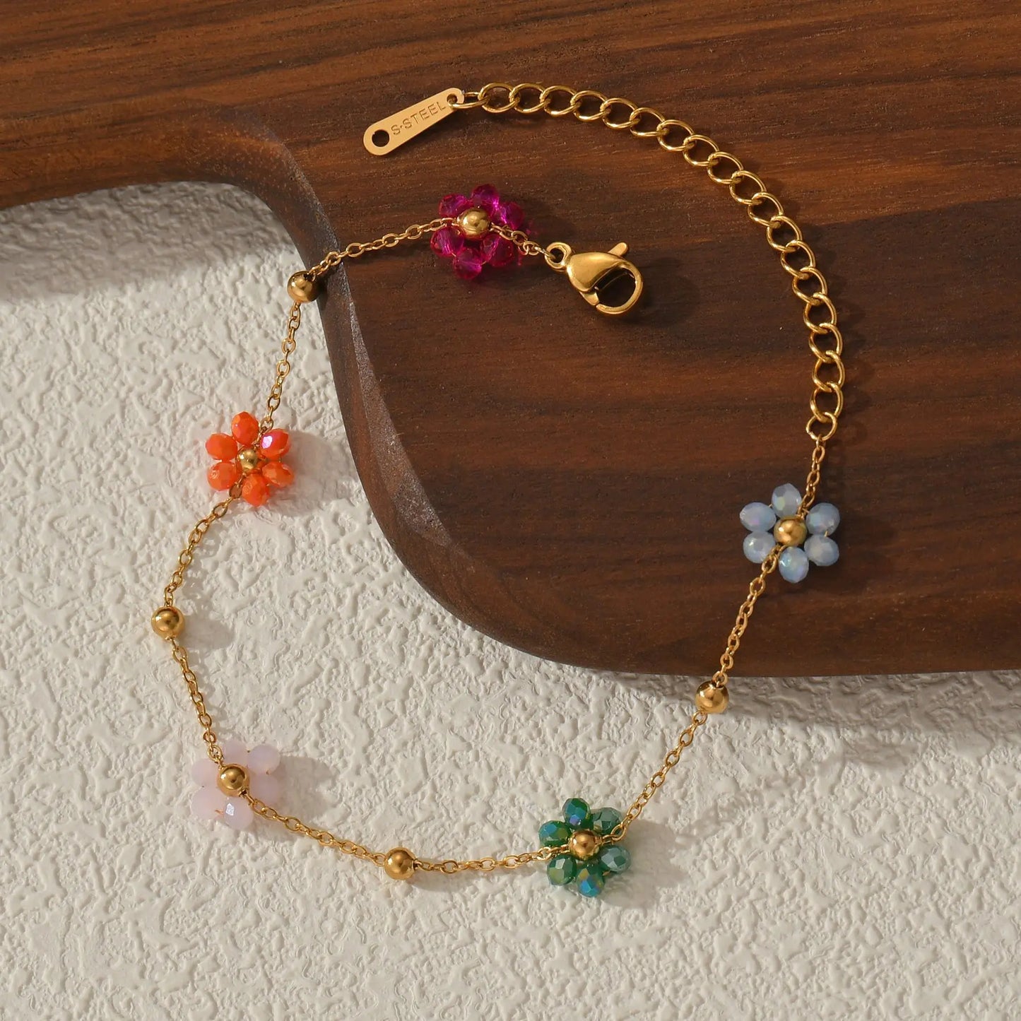 Bracelet avec fleurs multiples multicolores