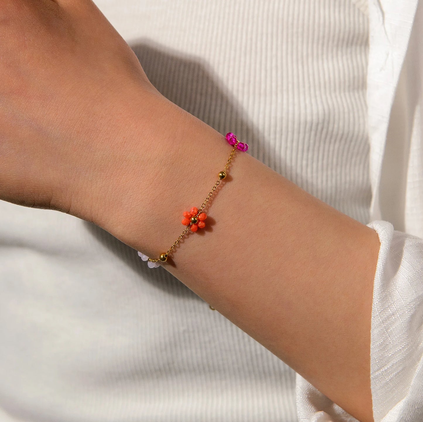 Bracelet avec fleurs multiples multicolores