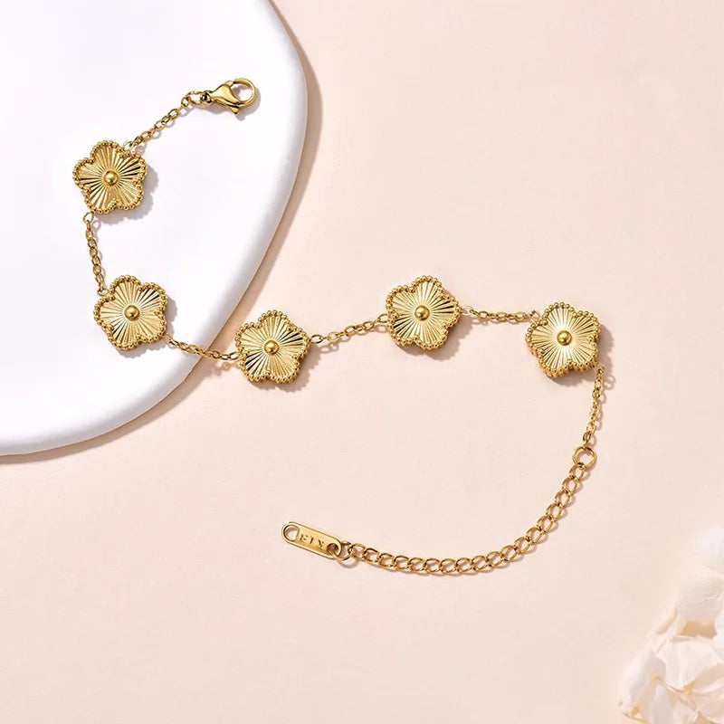 Bracelet fleurs doré multiple