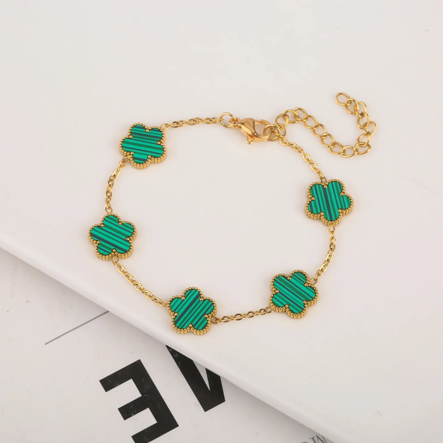 Bracelet fleurs vert or en acier inoxydable