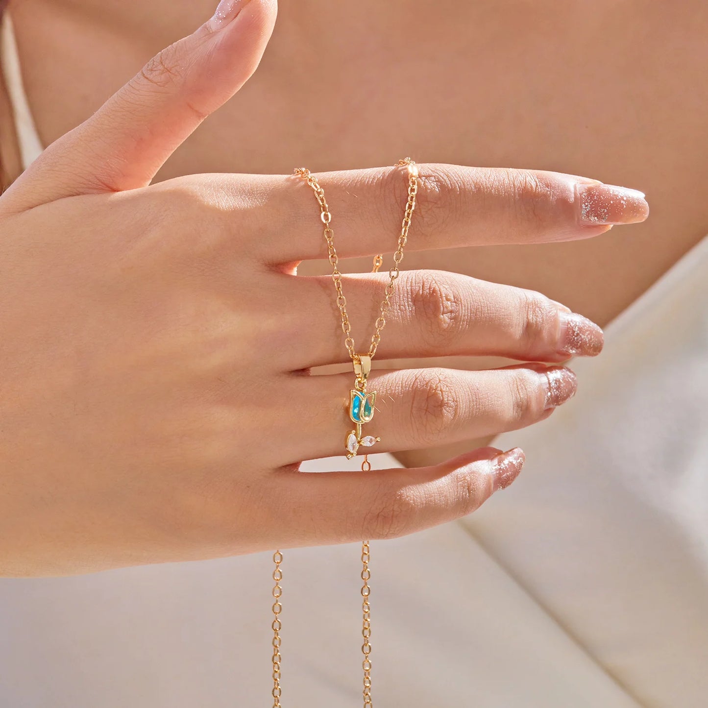 Collier avec pendentif tulipe doré et bleu