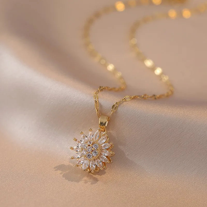 Collier fleur dorée rotative