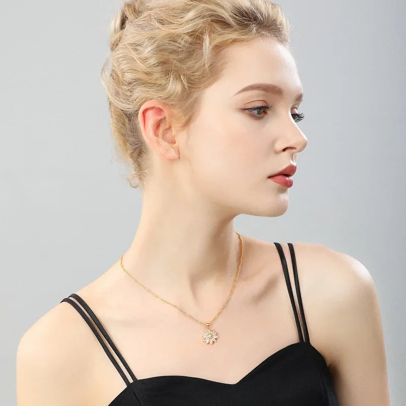 Collier fleur dorée rotative