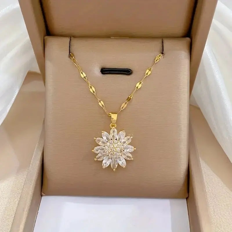 Collier fleur dorée rotative