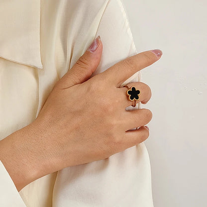 Bague fleur ajustable noire et or