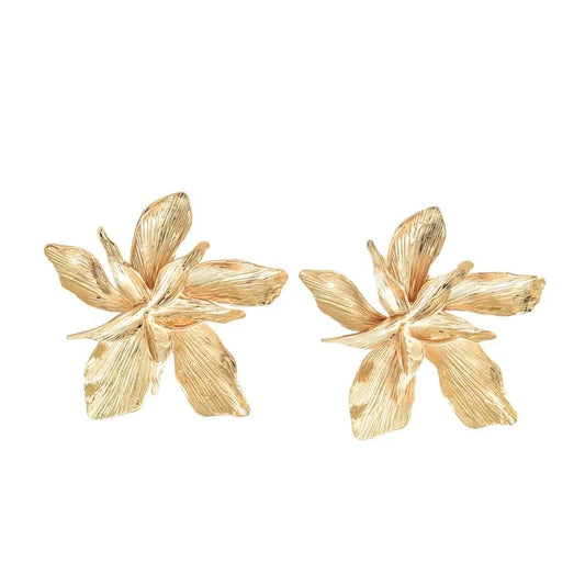 Boucles d'oreilles fleurs dorées design