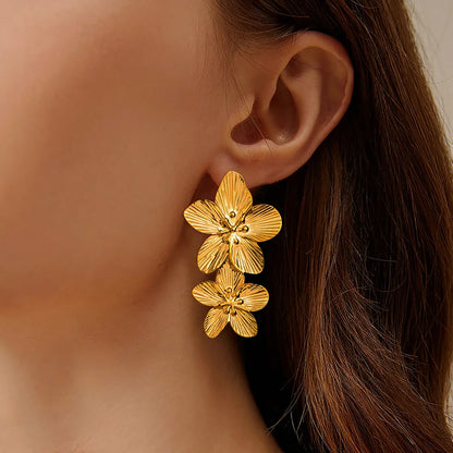 Boucles d'oreilles fleurs double dorées