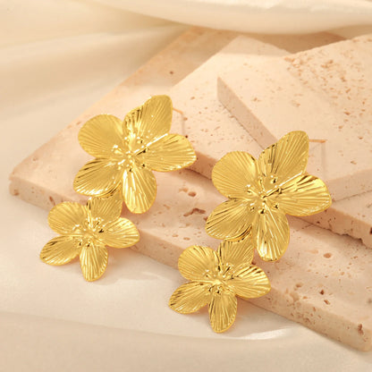 Boucles d'oreilles fleurs double dorées