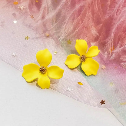 Boucles d'oreilles fleurs jaunes réalistes