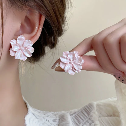 Boucles d'oreilles fleurs roses resine