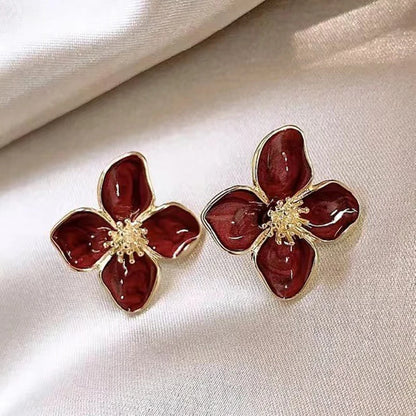 Boucles d'oreilles fleurs rouges romantiques
