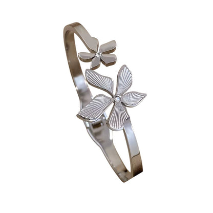 Bracelet ajustable argenté à deux fleurs design