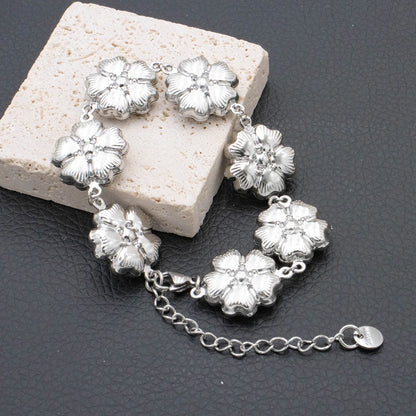 Bracelet argenté à fleurs multiples pleines