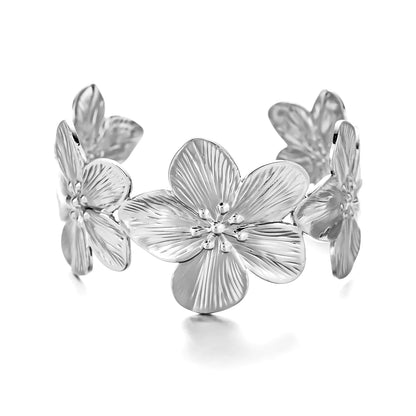 Bracelet argenté à fleurs ouvert