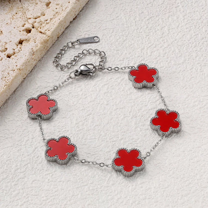 Bracelet argenté à fleurs rouges multiples
