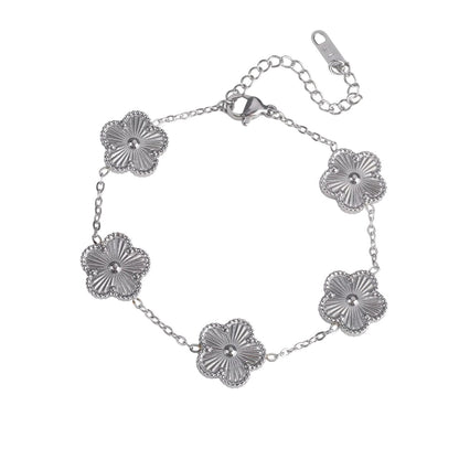 Bracelet argenté avec fleurs multiples