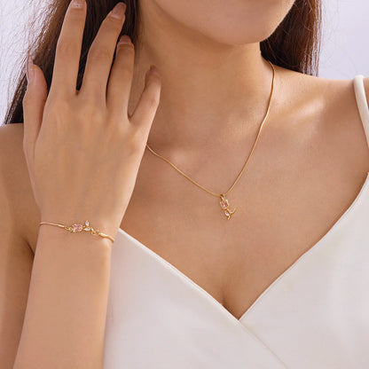 Bracelet avec pendentif tulipe doré et rose