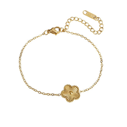 Bracelet doré avec fleur unique