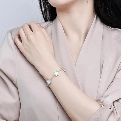 Bracelet fleurs blanc et argent