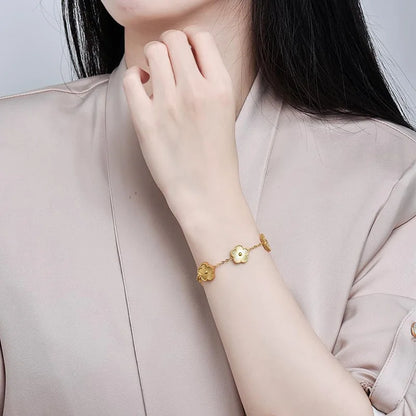 Bracelet fleurs doré multiple