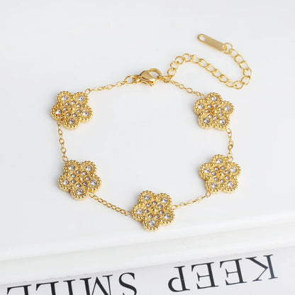 Bracelet fleurs or brillant avec cristaux