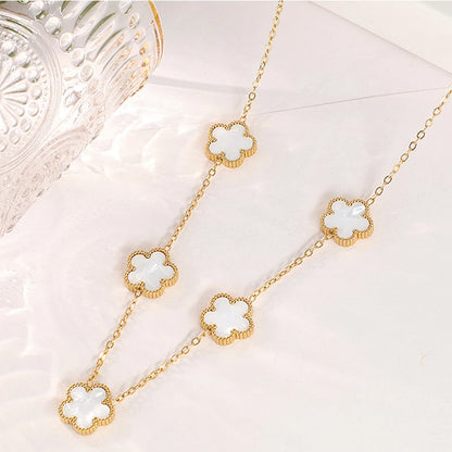 Collier fleurs blanc et or multiple